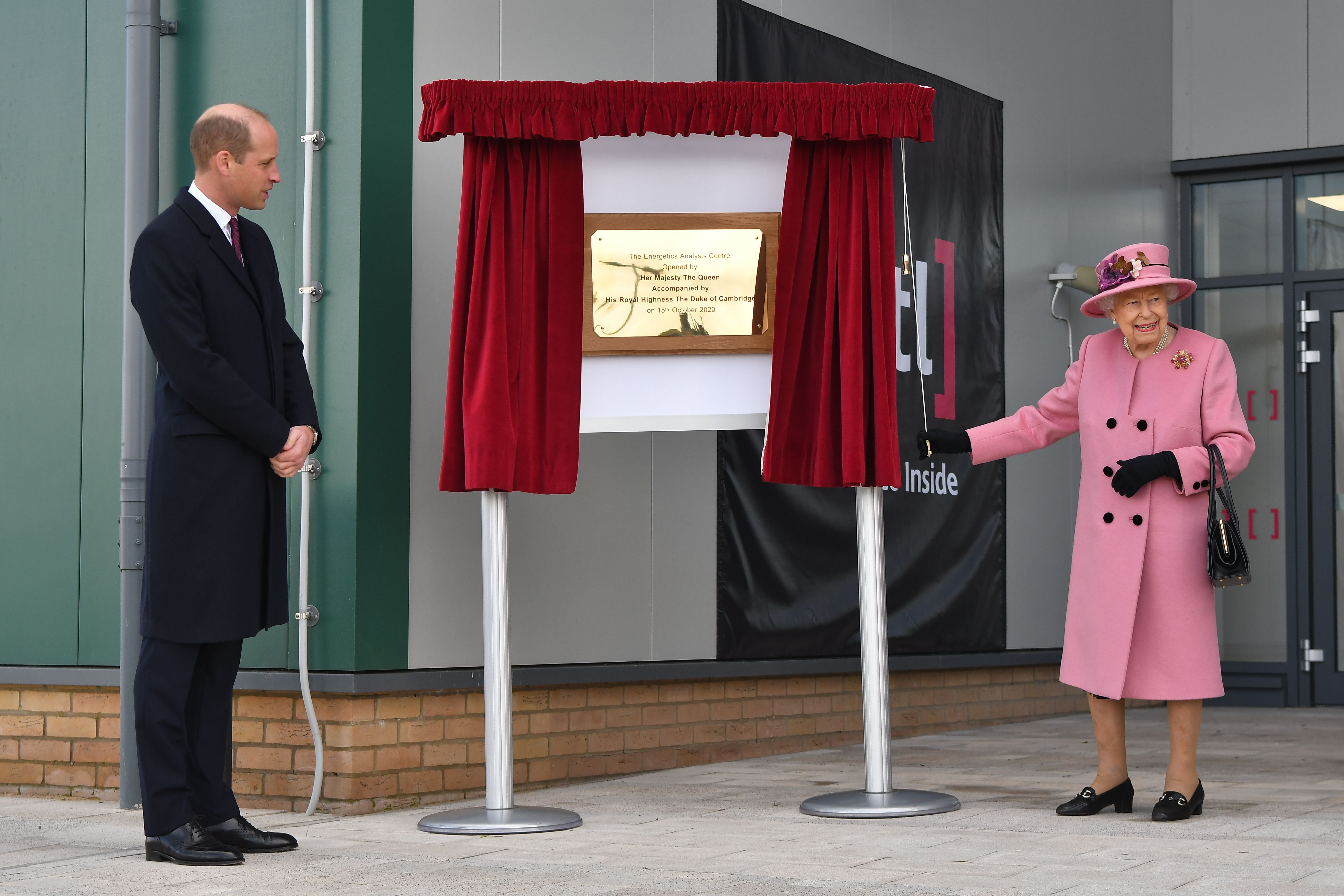Prince William and Queen Elizabeth unveiling a plaque