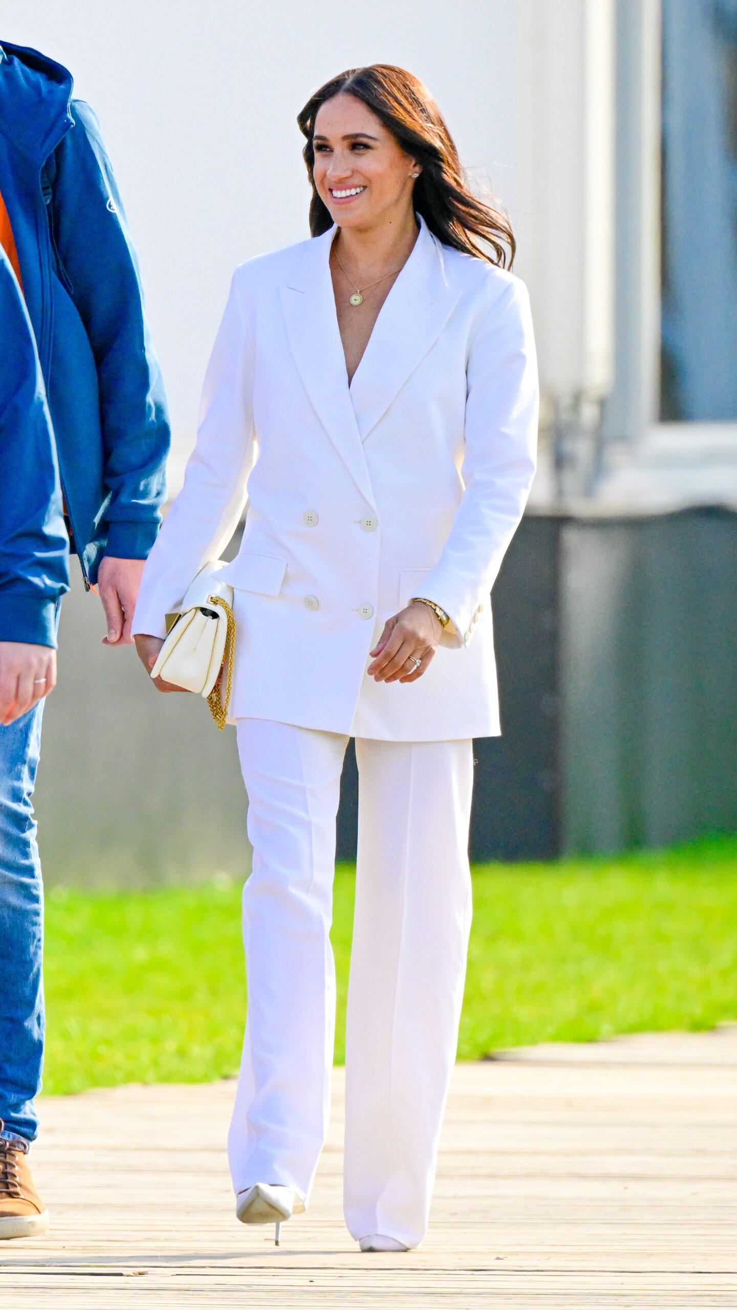 Meghan Markle wearing an all white suit