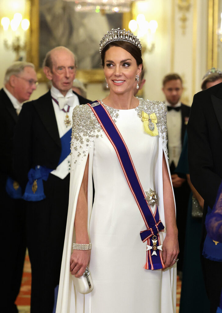 Princess Kate wearing a white cape gown at a banquet for The President Of The Republic Of South Africa