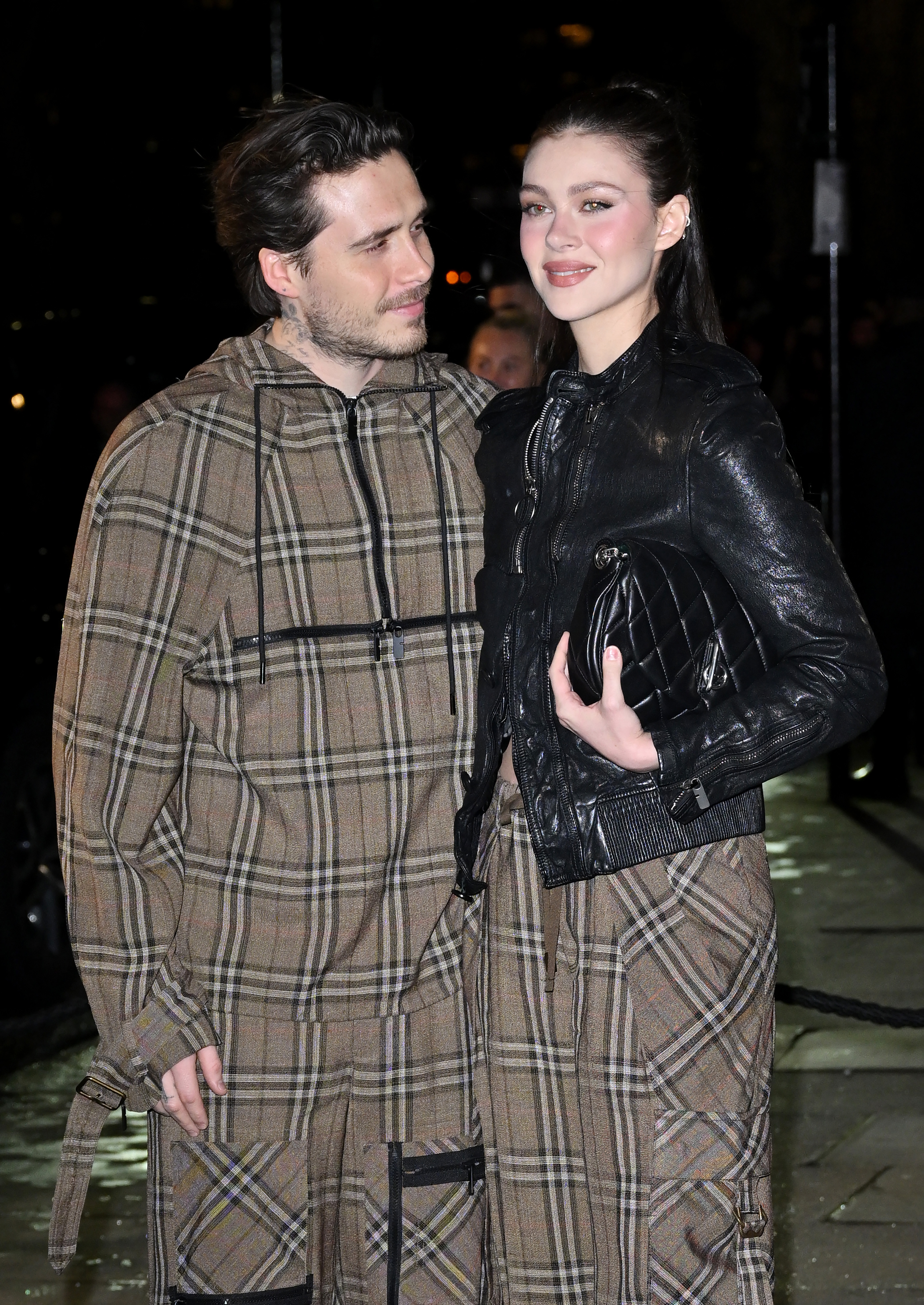 Brooklyn beckham and Nicola Peltz smiling together