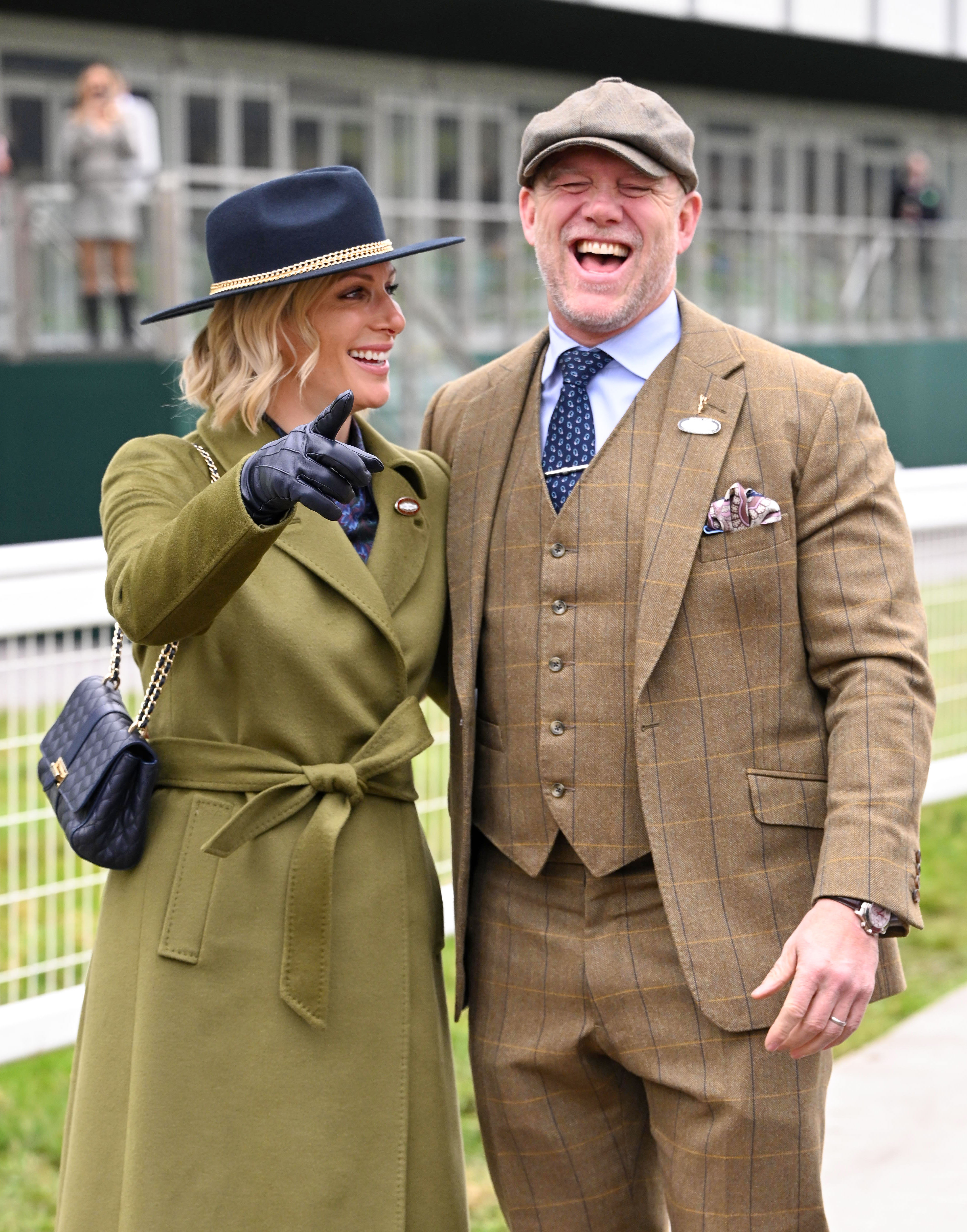 Zara and Mike Tindall laughing side by side