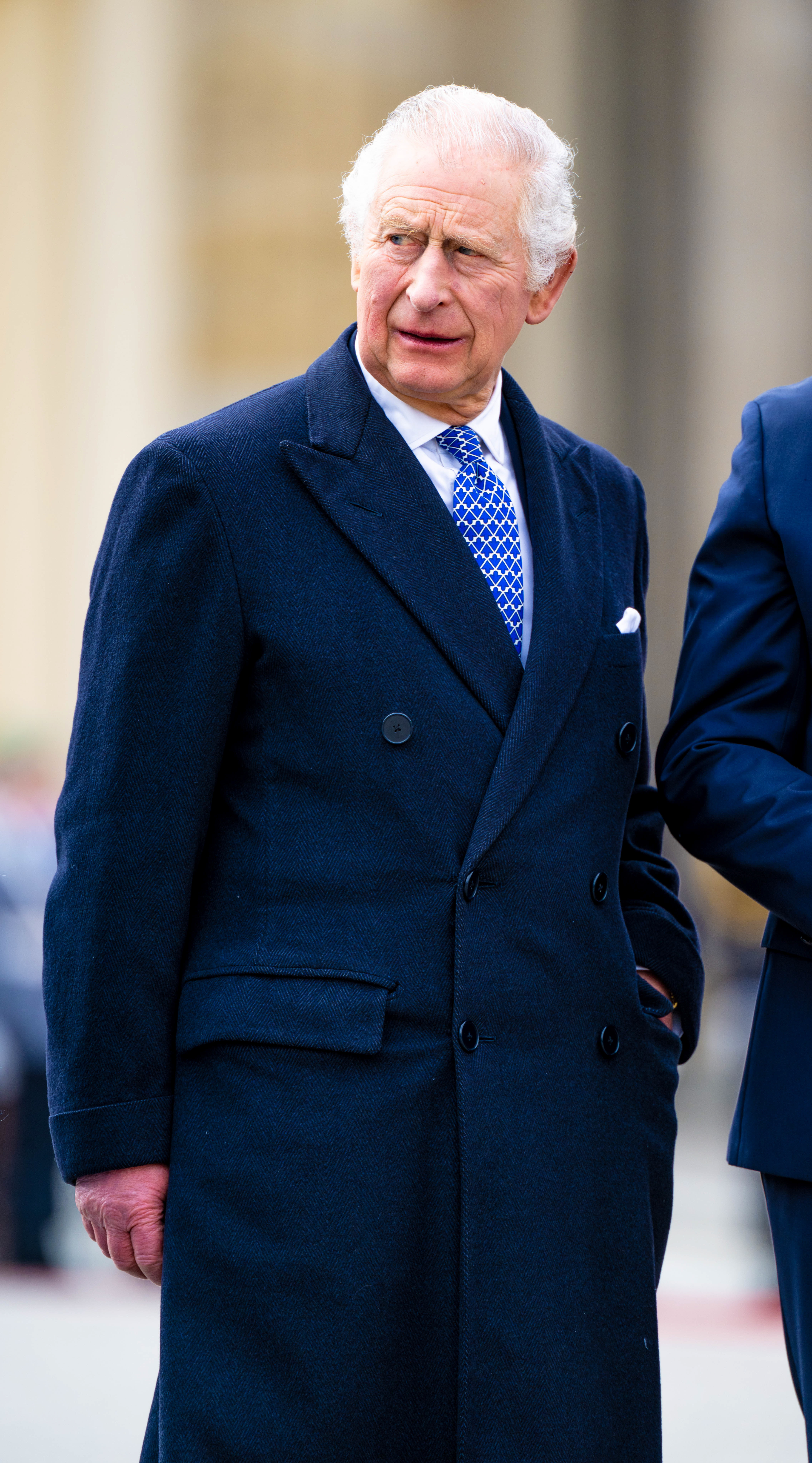 King Charles grimacing