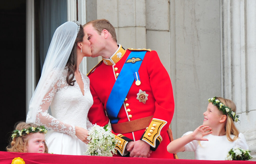 Kate Middleton and Prince William kissing on their wedding