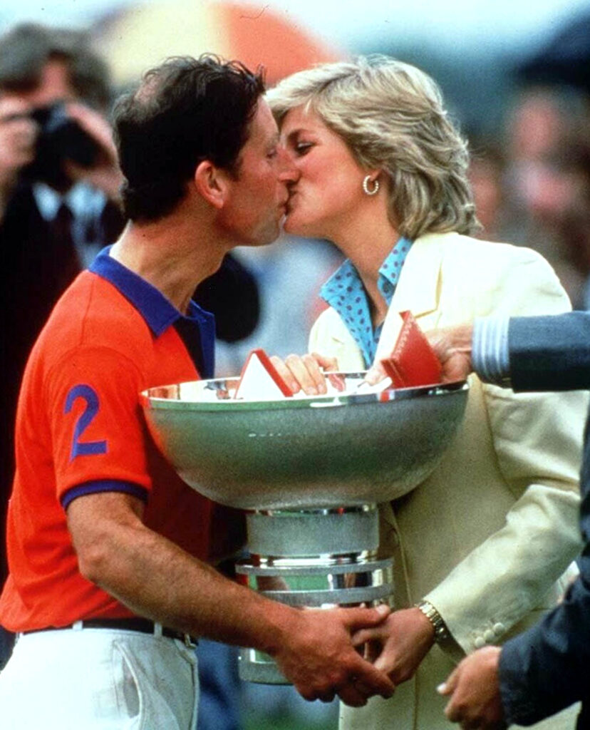 King Charles and Princess Diana sharing a kiss
