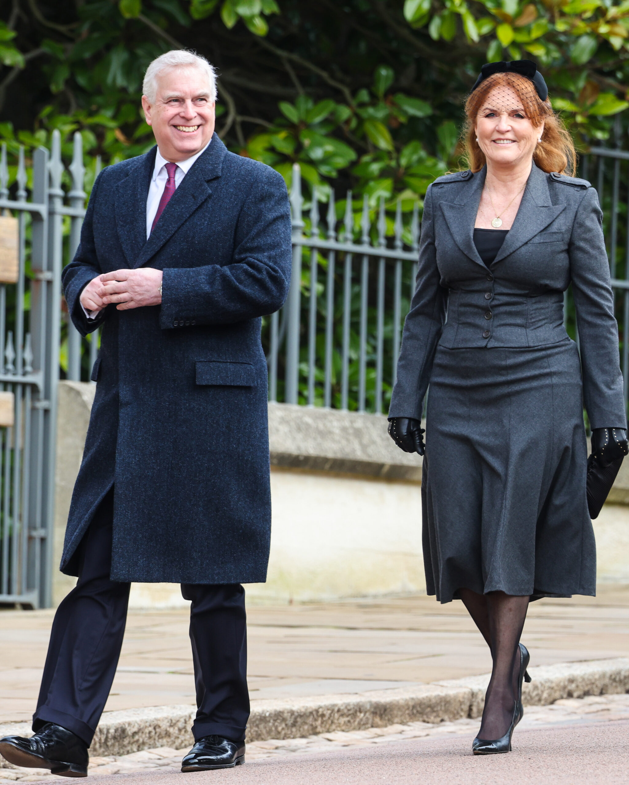 Andrew Mountbatte-Windsor and Sarah Ferguson smiling as they walk together