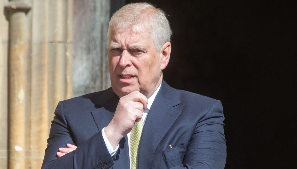 Andrew Mountbatten-Windsor resting his hand on his chin