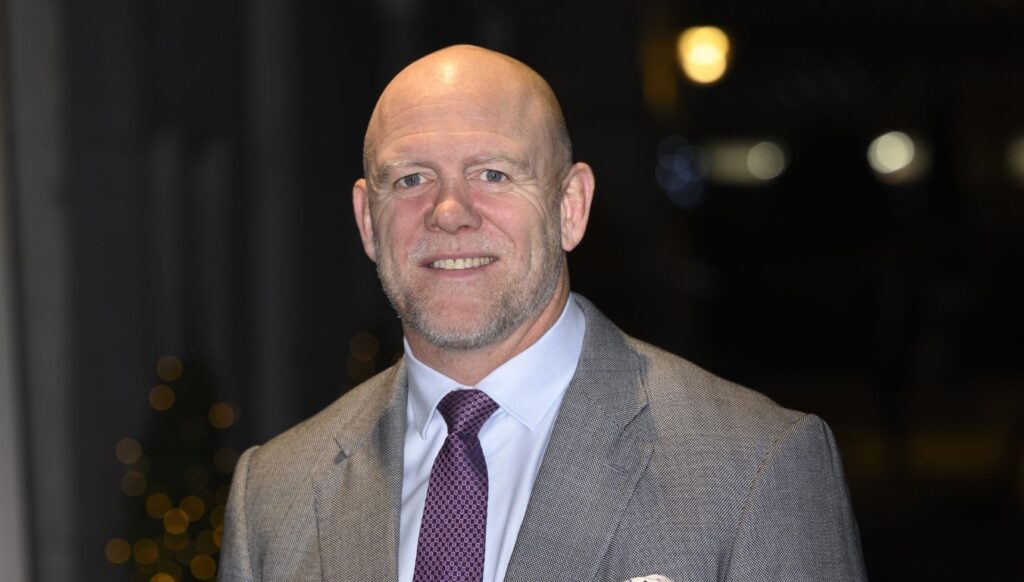 Mike Tindall in grey suit at event