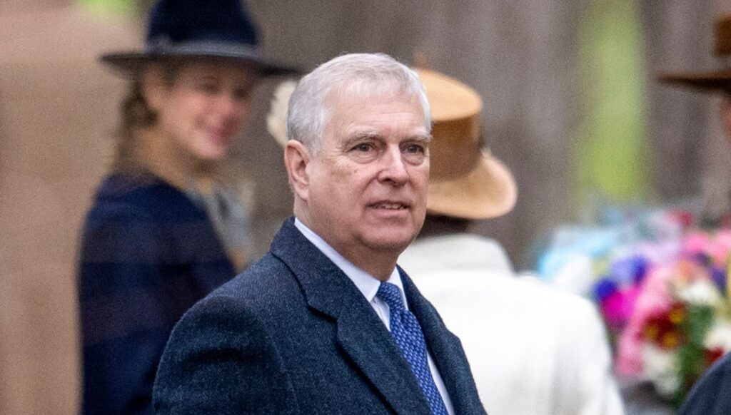 Andrew Mountbatten-Windsor in a suit and coat 