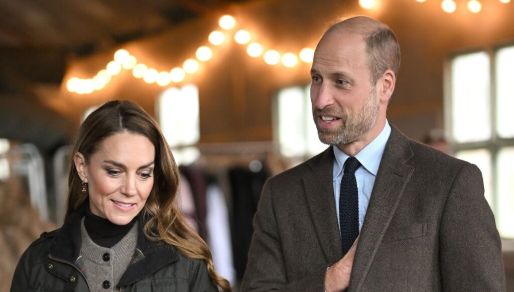 Prince William and Princess Kate smiling on visit