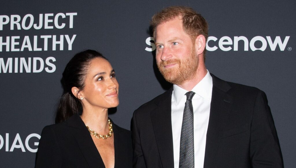 Meghan Markle looking at Prince Harry at event