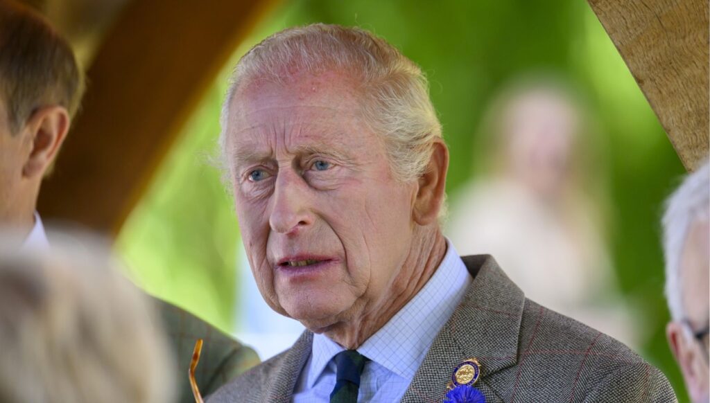 King Charles looks worried on outing