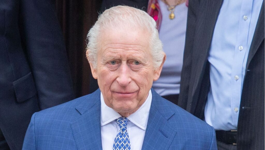 King Charles in blue suit