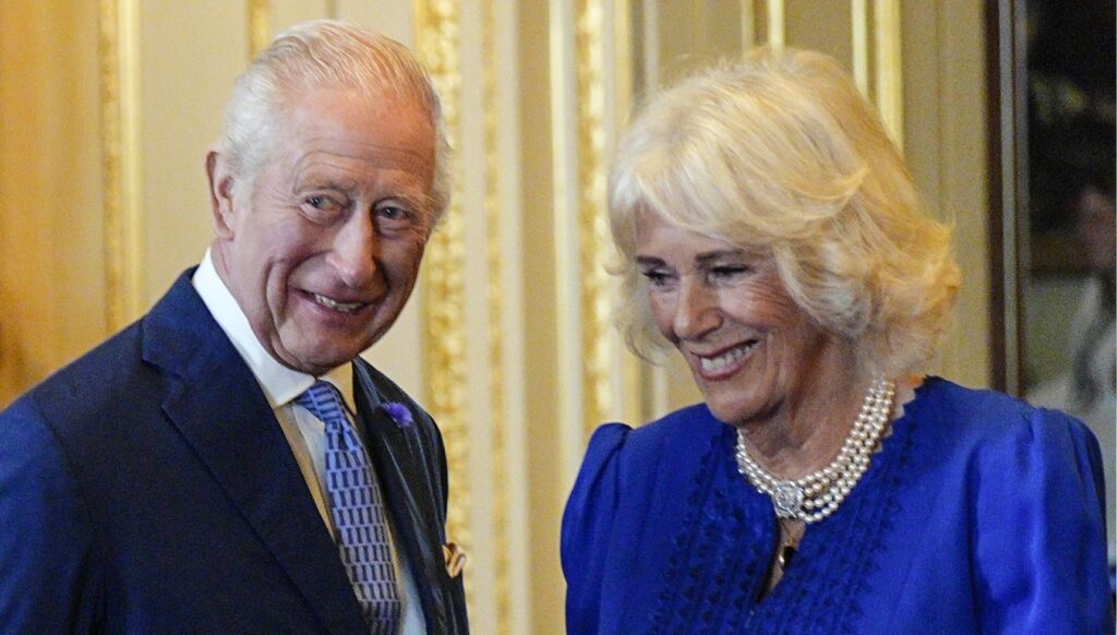 King Charles and Queen Camilla smiling