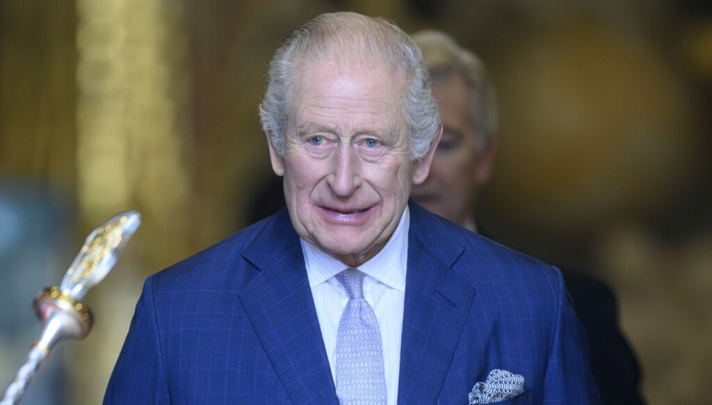 King Charles in blue suit for service