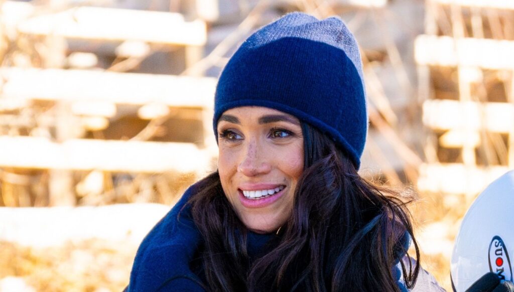 Meghan Markle smiling in beanie