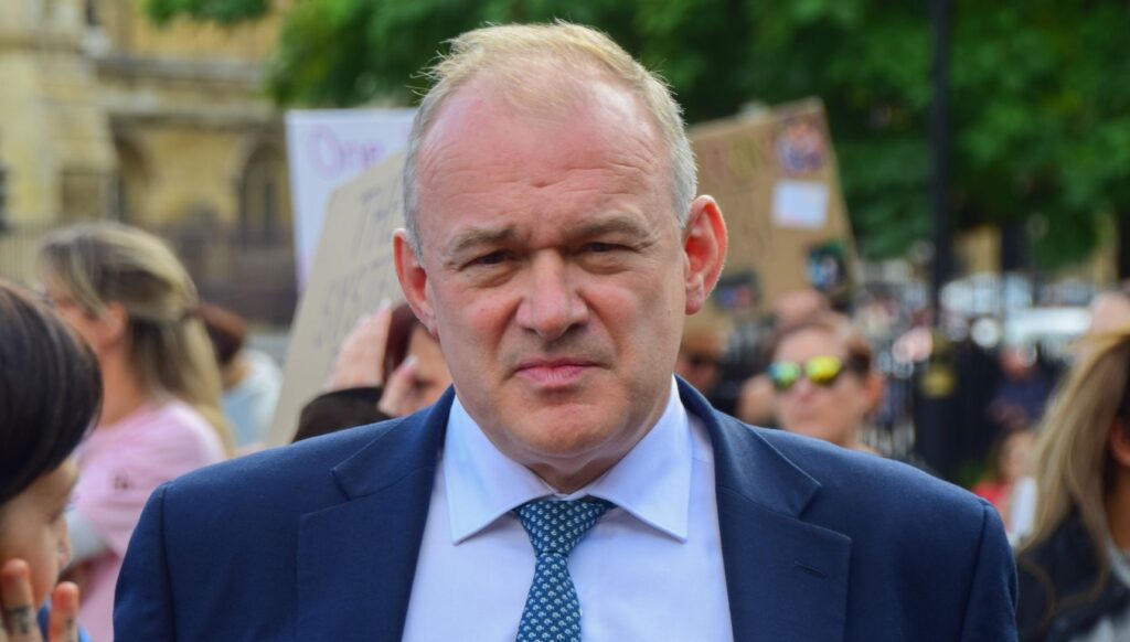 Ed Davey looking at the camera 
