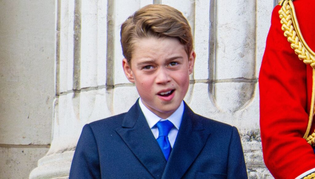 Prince George in a blue suit and tie