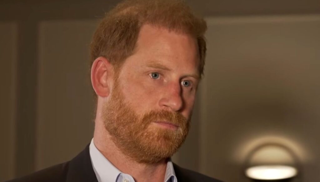 Prince Harry with a stern expression