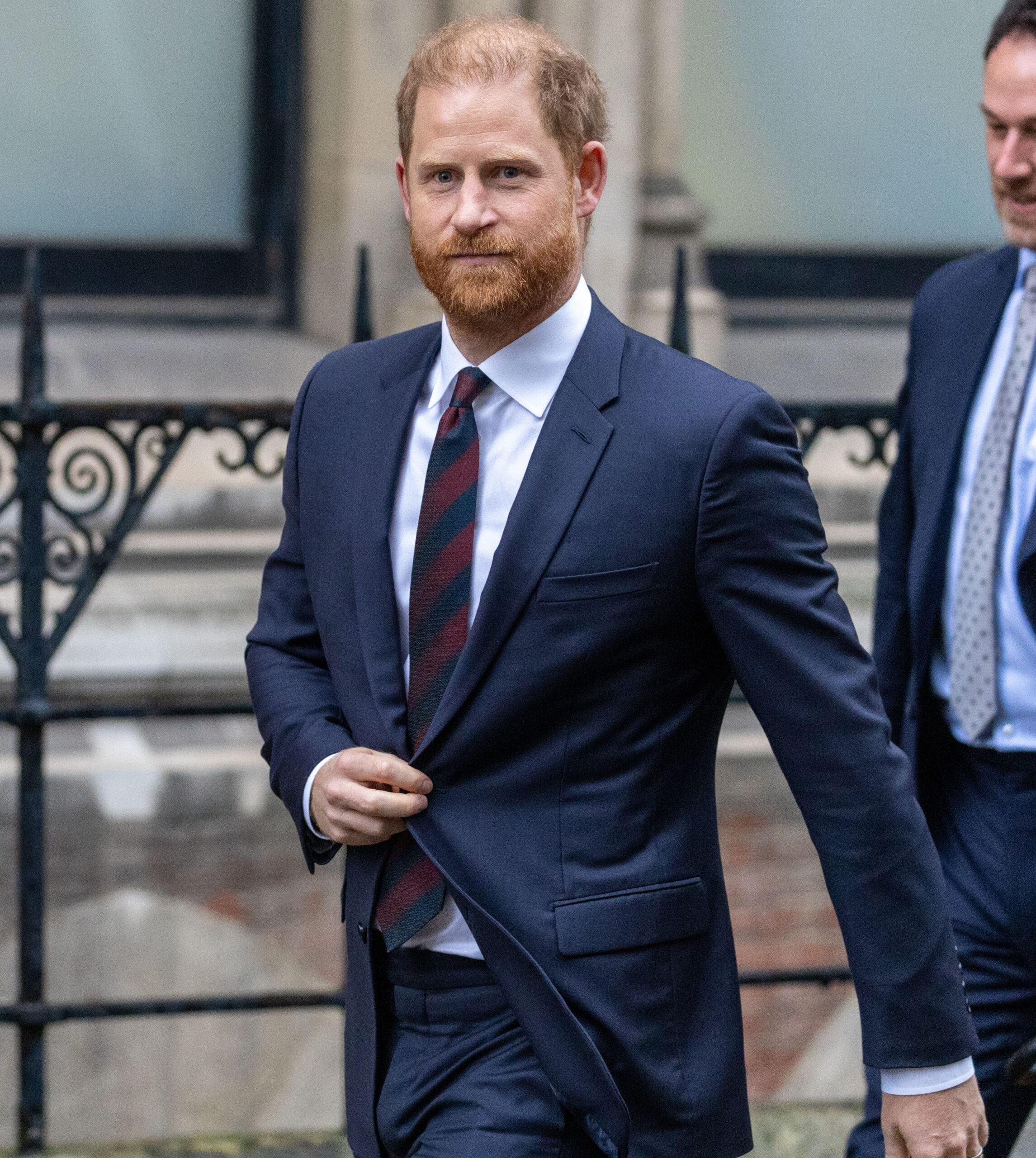 Prince Harry walking in suit