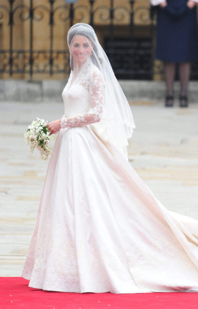 Princess Kate on her wedding day wearing her lace Alexander McQueen wedding gown 