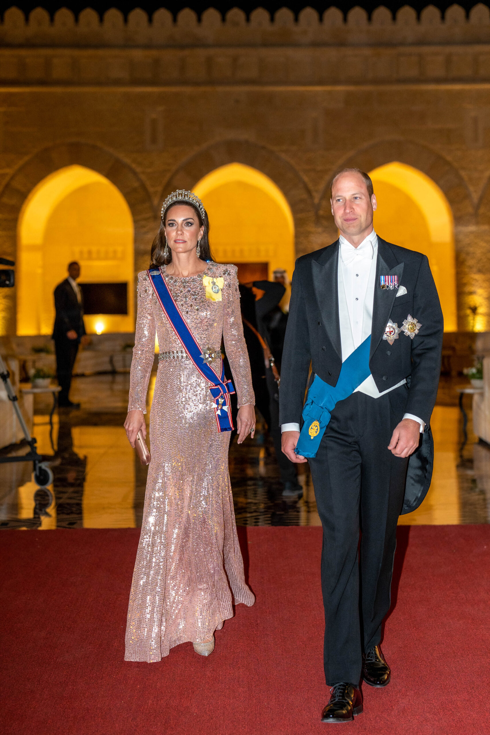 Princess Kate in a pink and silver sequin gown alongside Prince William