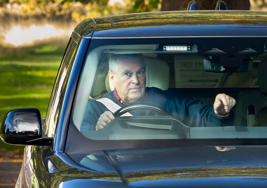 Andrew Mountbatten-Windsor driving a car on the Windsor estate