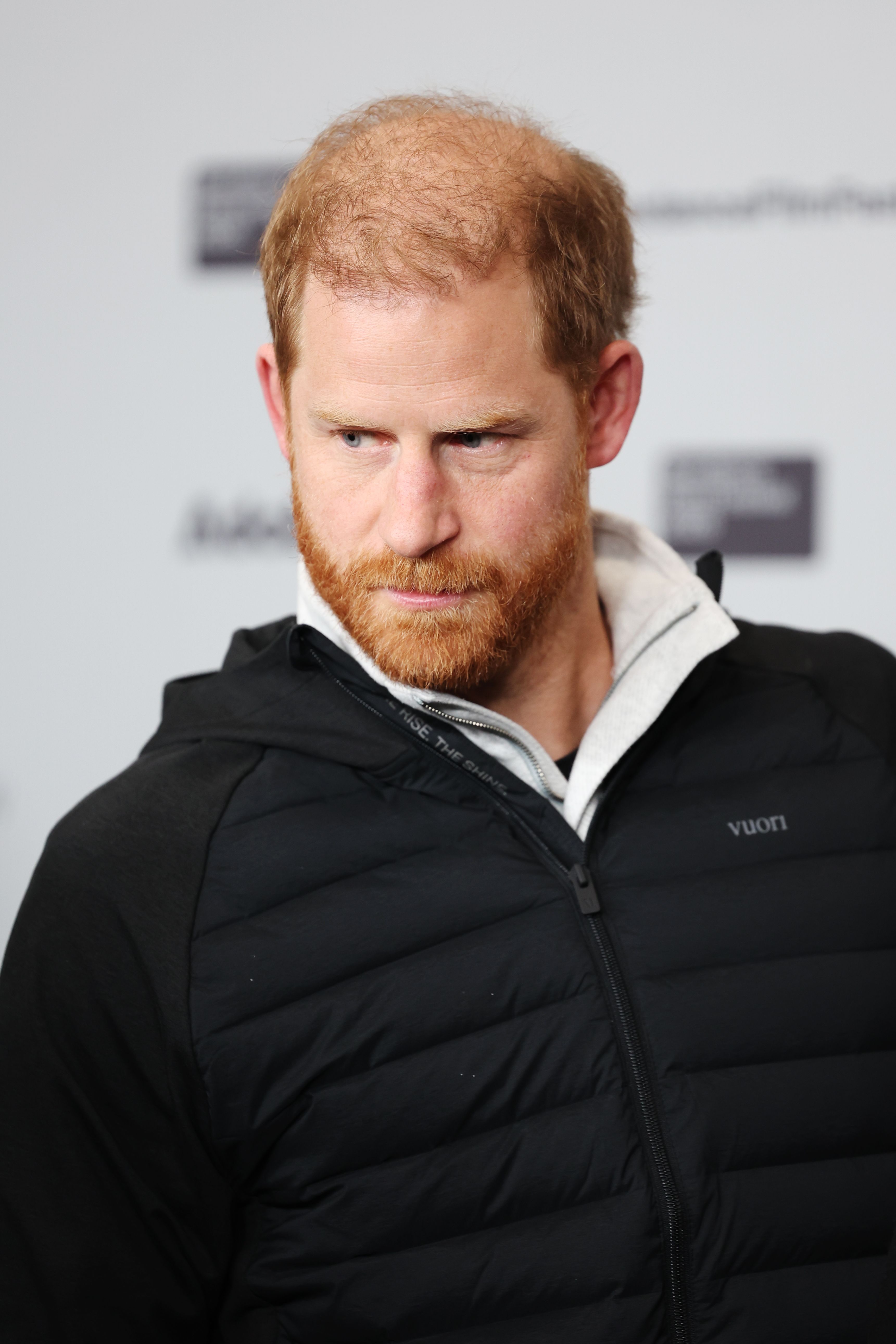 Prince Harry frowning