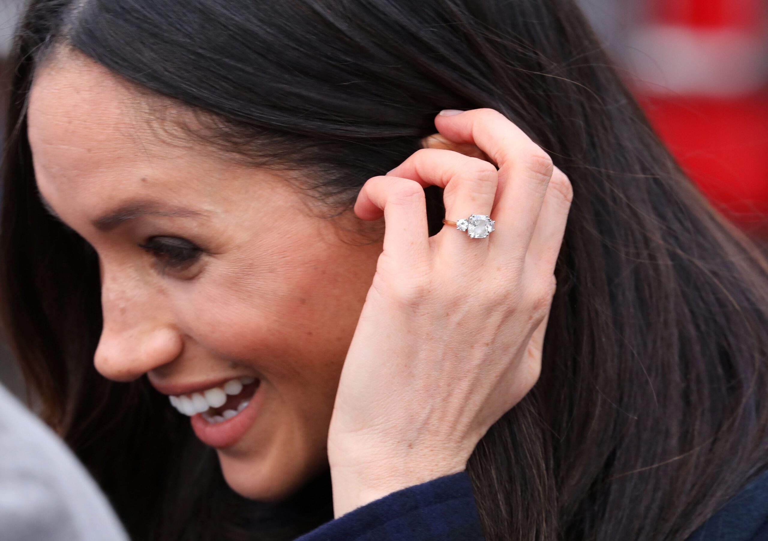 A close up shot of Meghan Markle wearing her engagement ring
