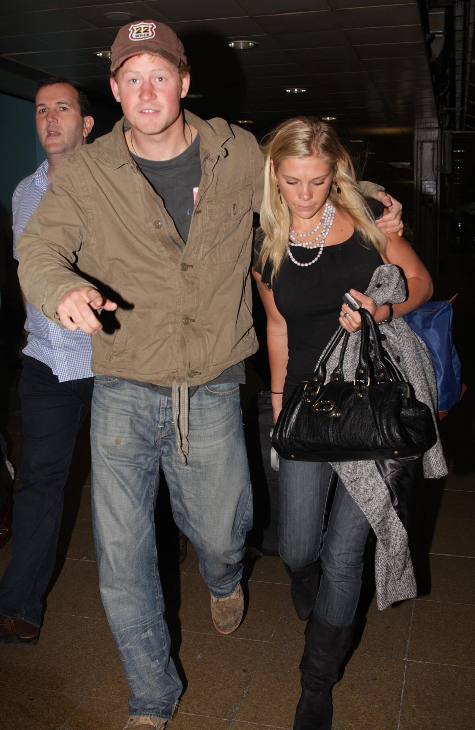 Prince Harry and Chelsy Davy arm in arm