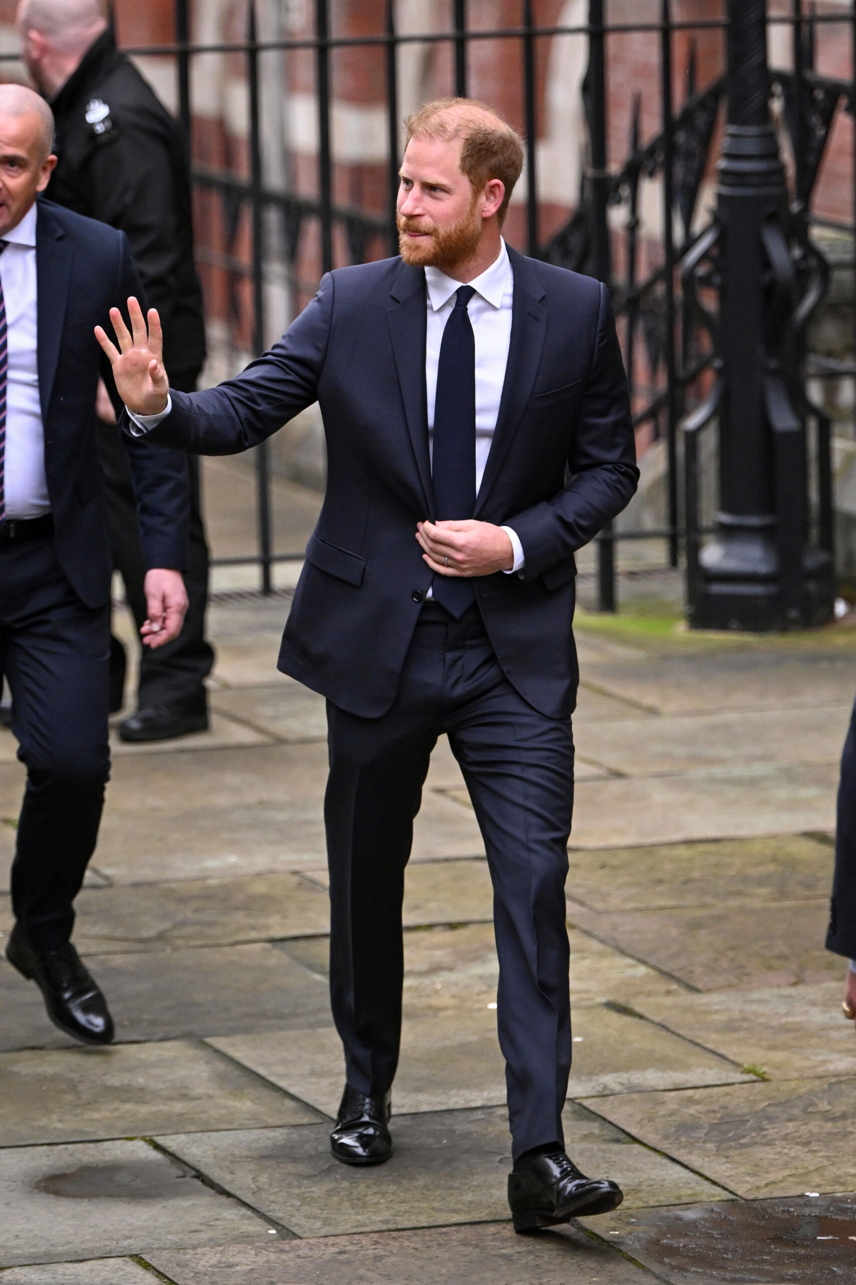 Prince Harry waving as he arrived at High Court in January