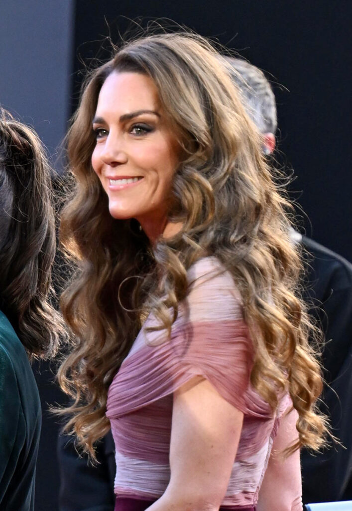 Princess Kate smiling with curled tresses at the BAFTAs