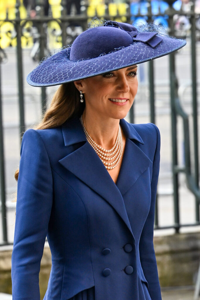 Princess Kate wearing a blue hat and coatdress at the Commonwealth Day service