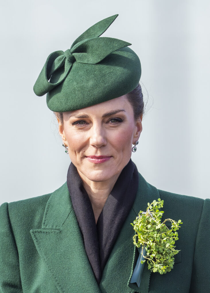 Princess Kate smiling wearing green