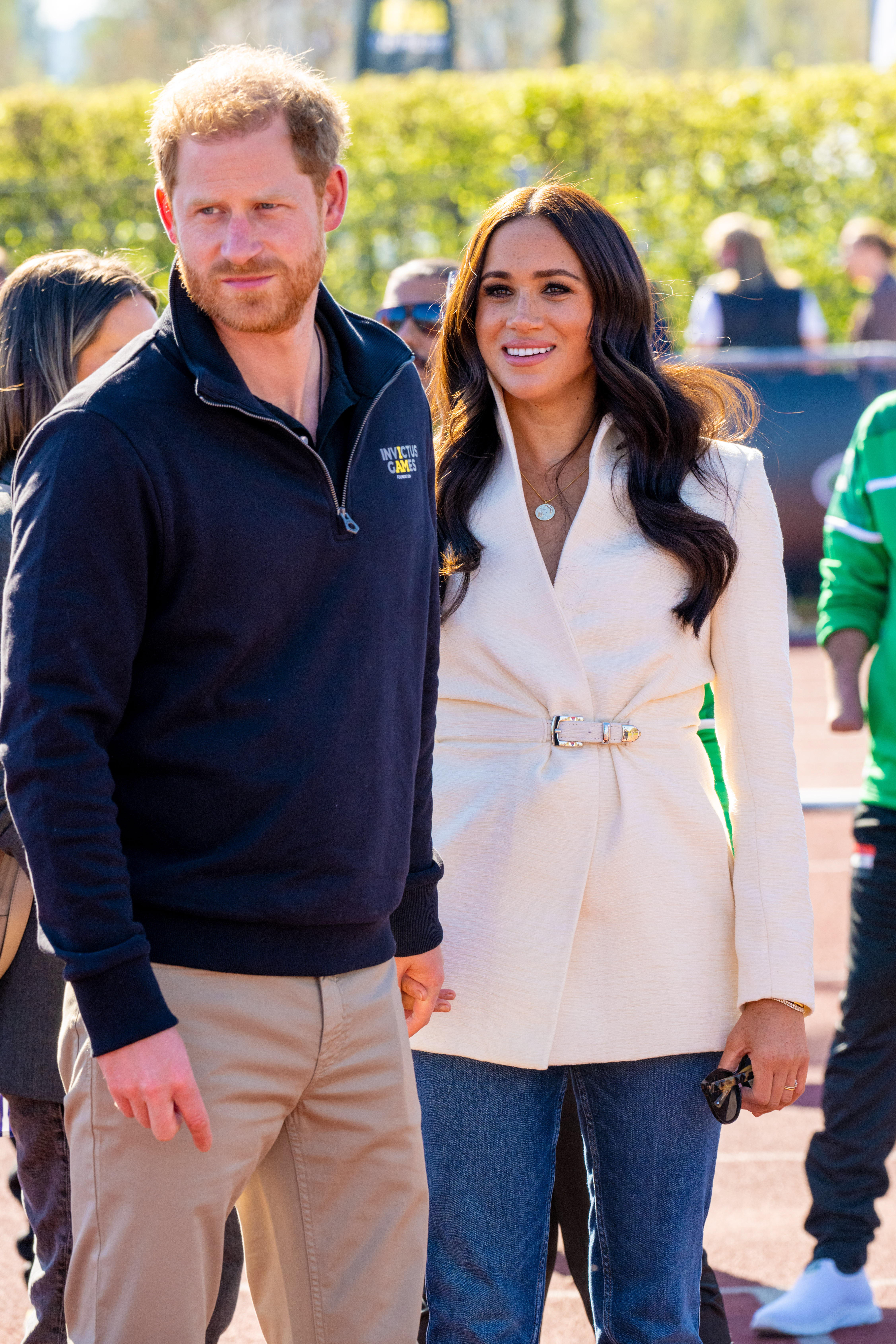 Harry and Meghan smiling together