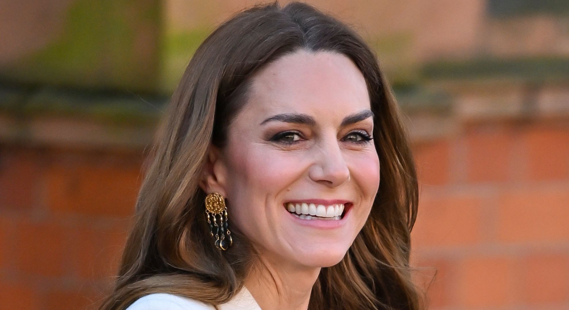 Kate Middleton unexpectedly 'slipped off her shoes' and 'joined in' with dance circle during latest outing in Leicester