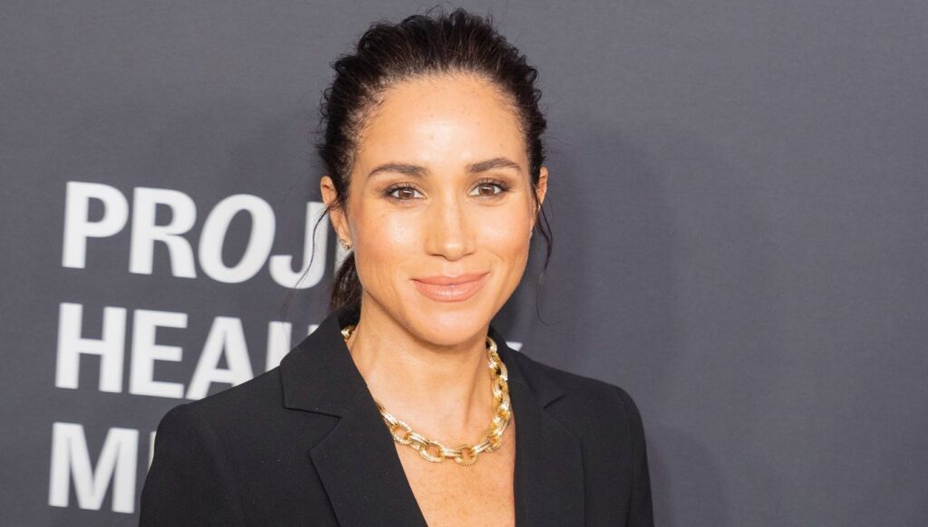 Meghan Markle smiling at event