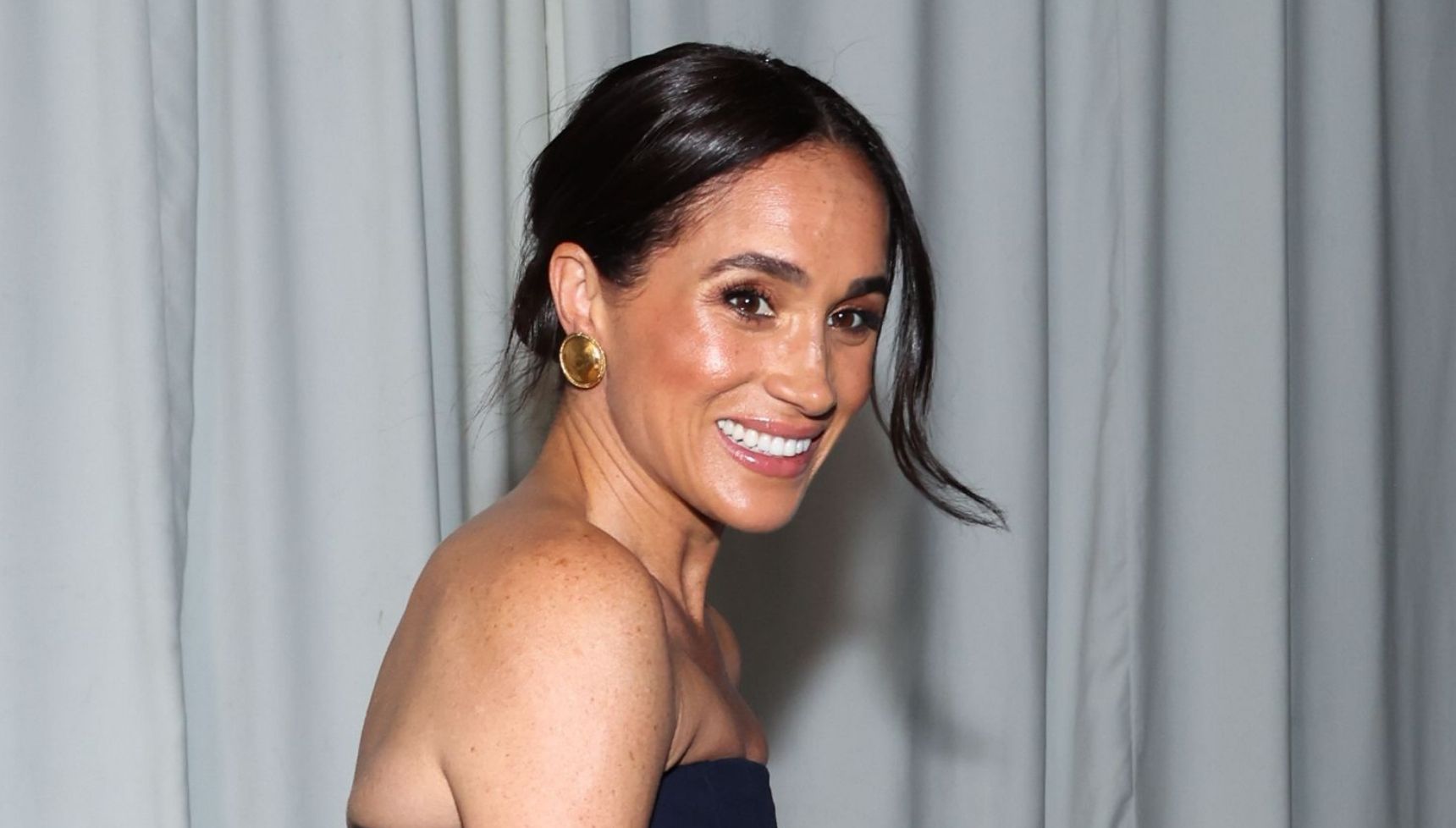 Meghan Markle fans beg to know her secrets as her appearance in strapless dress causes a stir