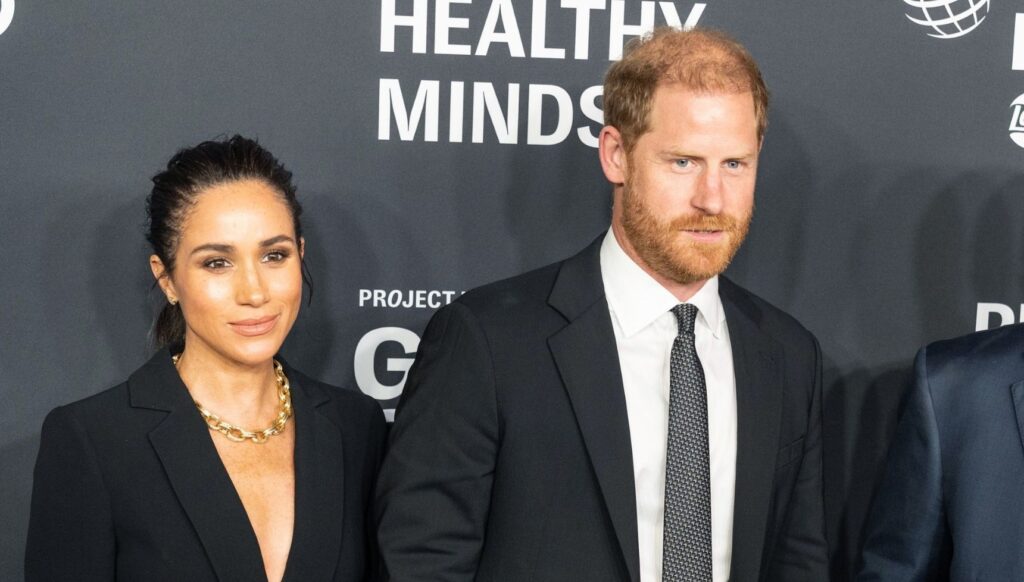 Meghan Markle and Prince Harry posing at New York event