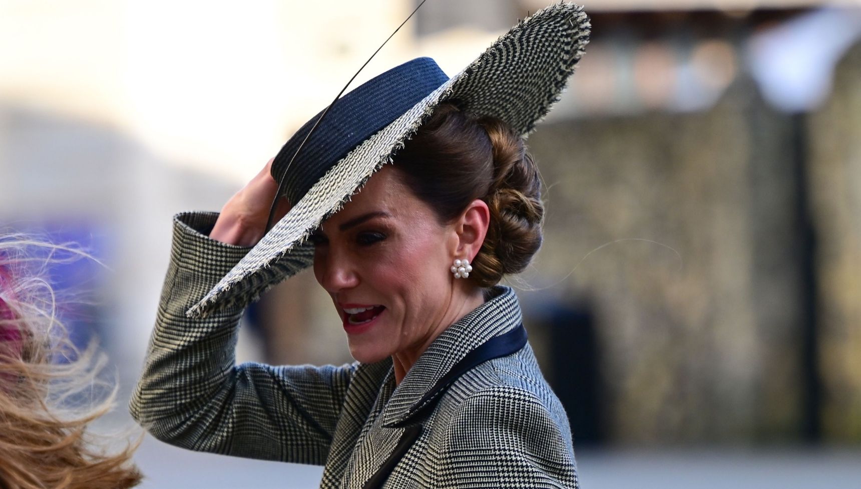 Kate Middleton deals with unfortunate 'struggle' with her hat during historic ceremony