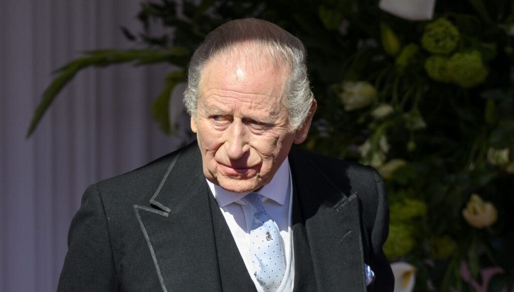 King Charles frowning at royal event