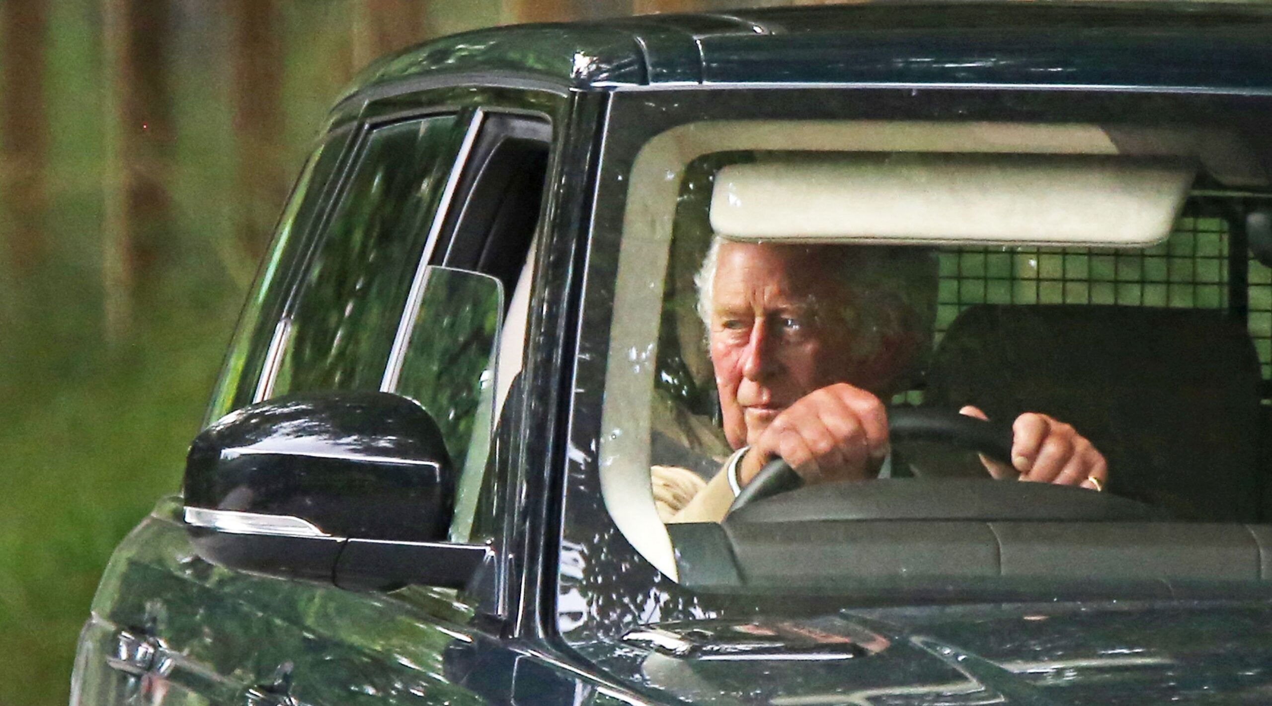 King Charles driving