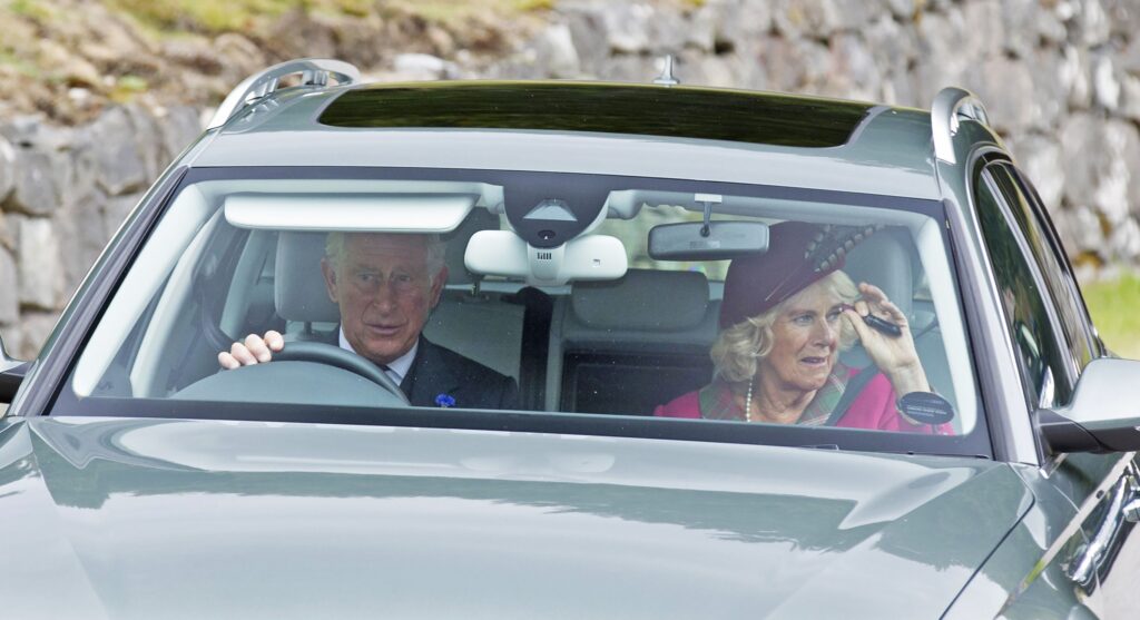 King Charles driving Queen Camilla in Scotland