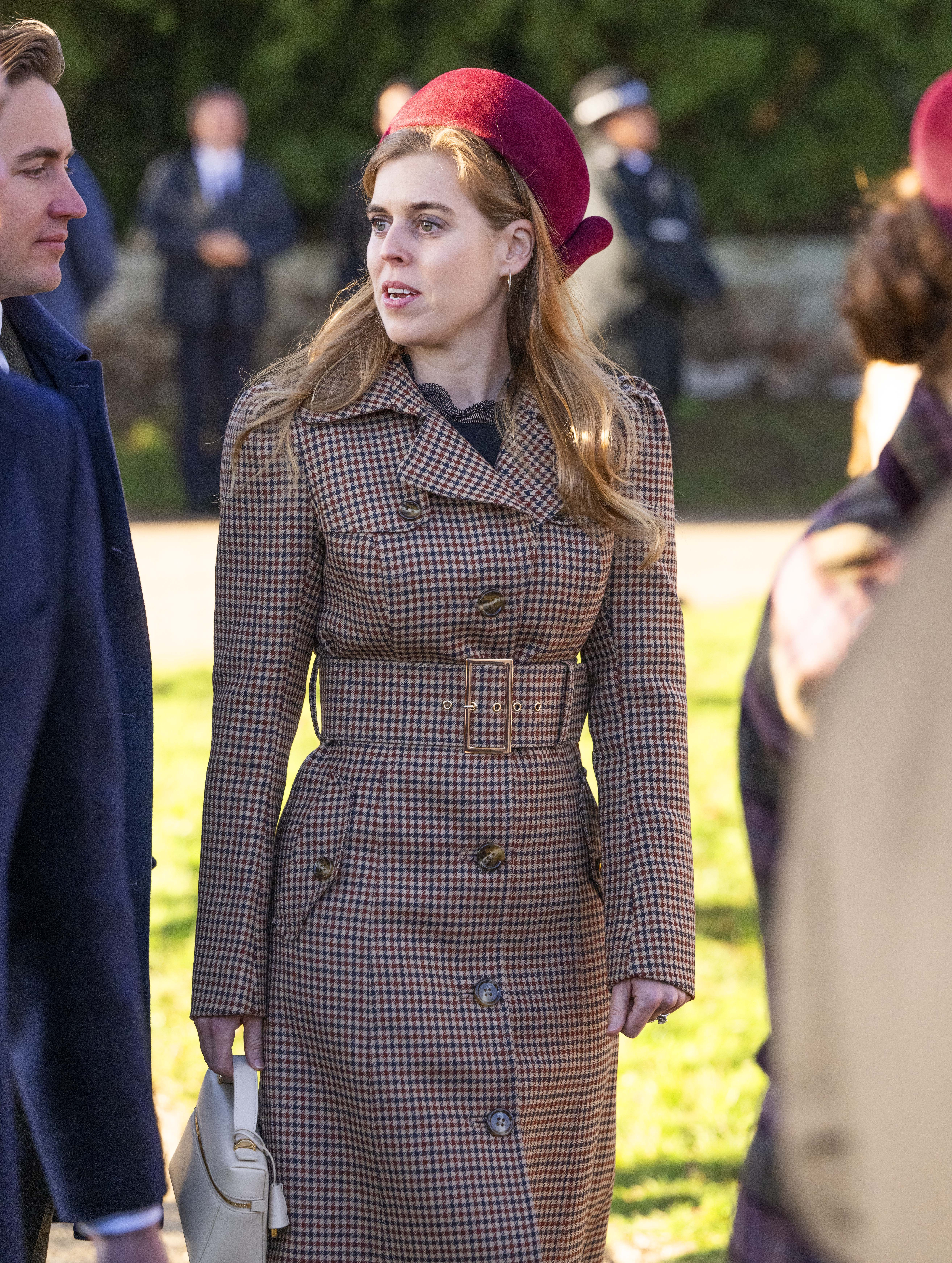 Princess Beatrice walking and smiling