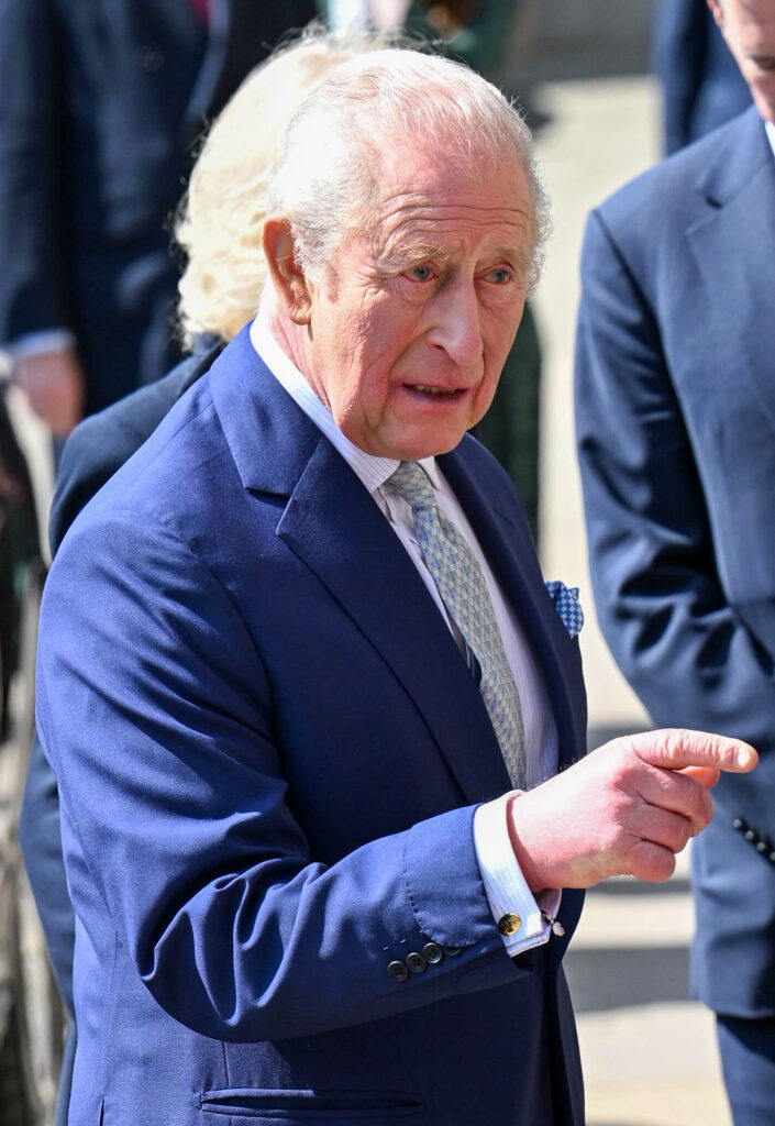 King Charles pointing and frowning