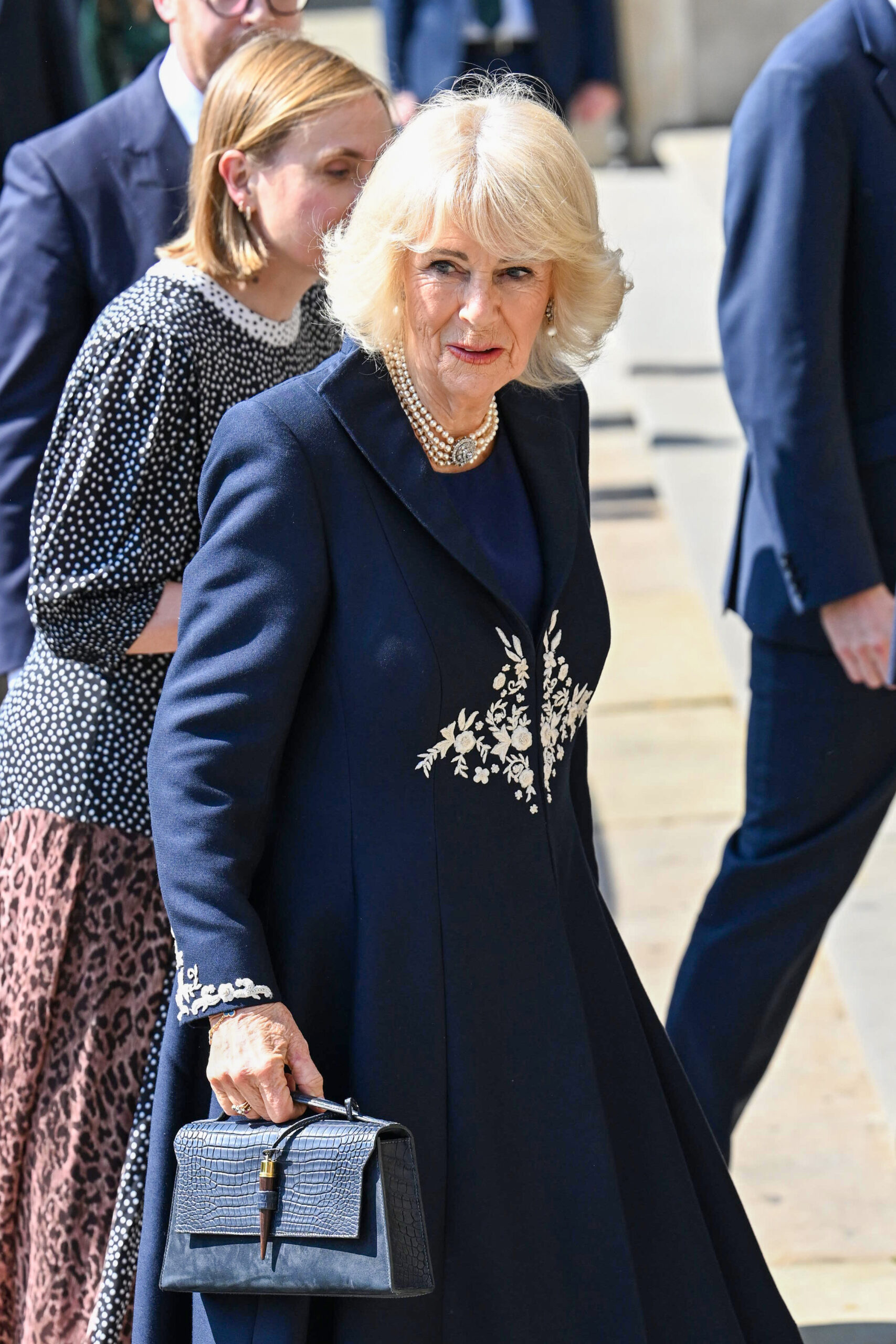 Queen Camilla with a serious expression