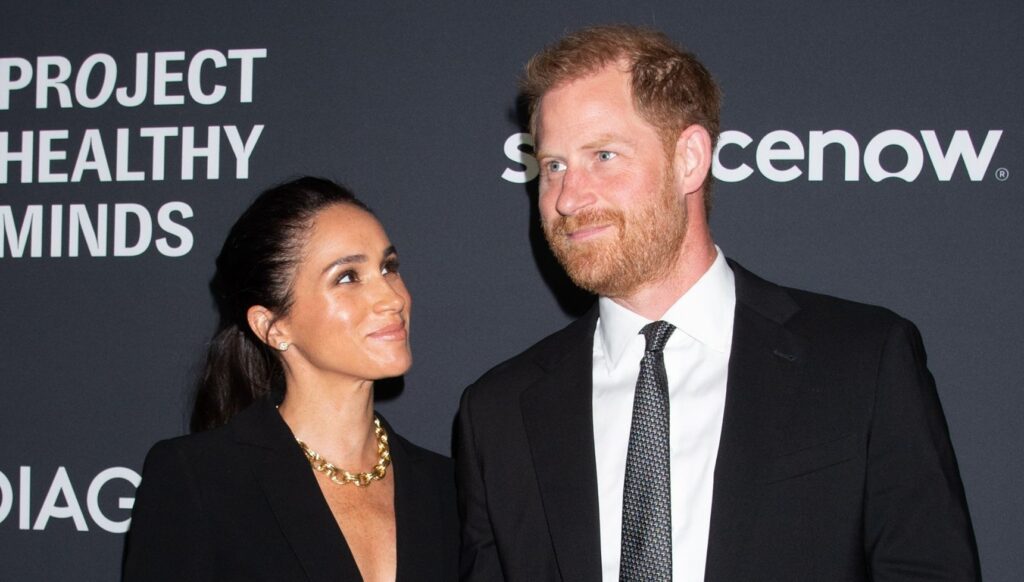 Meghan Markle looking at Prince Harry at event