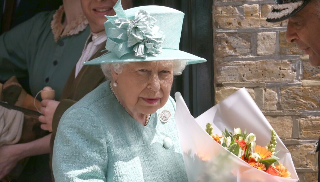Queen Elizabeth II in blue outfit on Easter