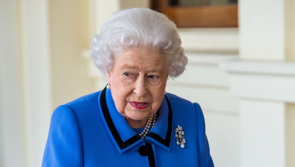 Queen Elizabeth II in blue outfit