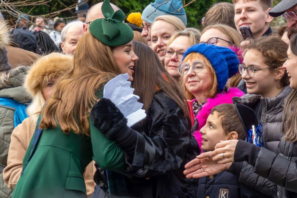 Kate Middleton hugging well-wisher on Christmas