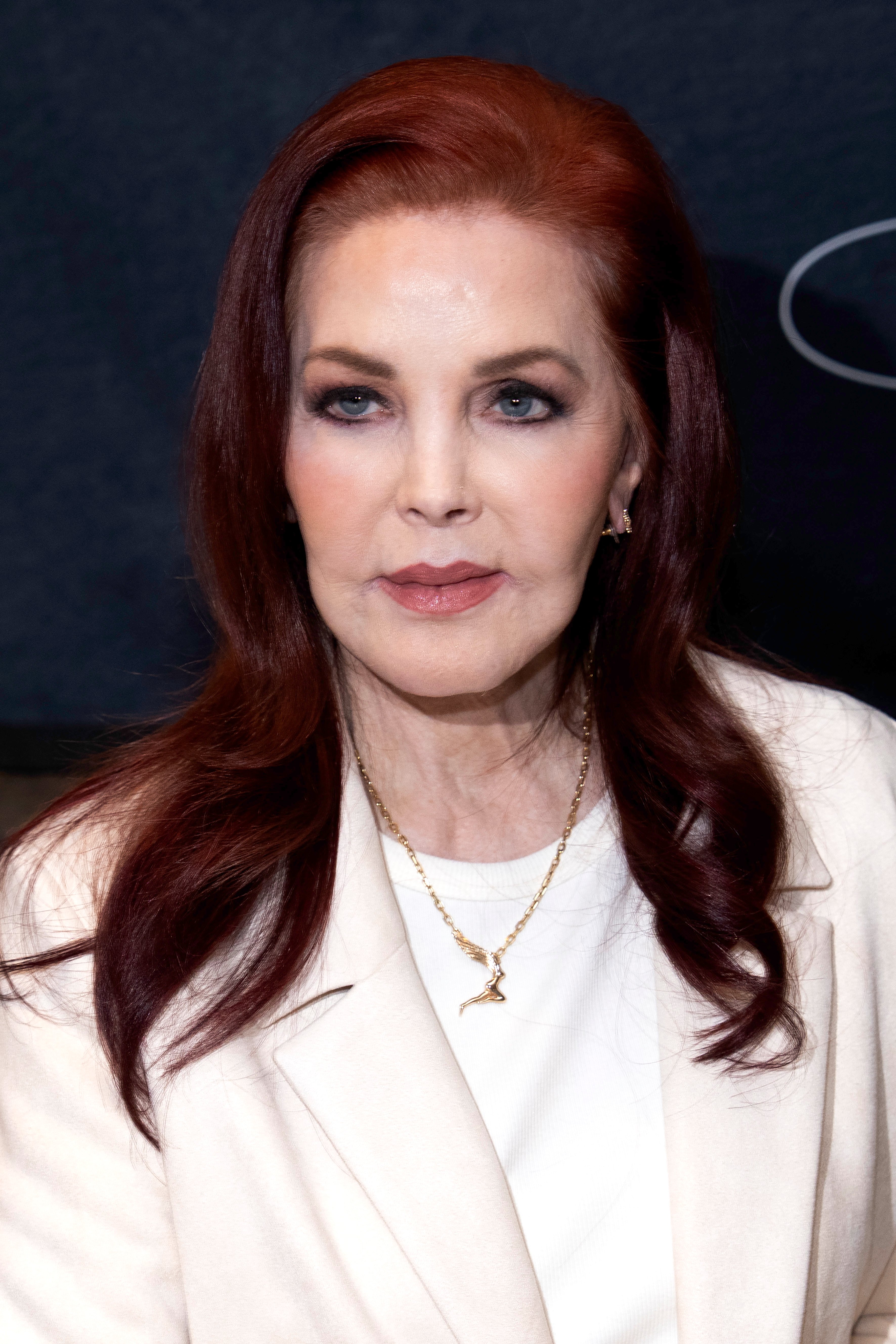 Priscilla Presley wearing white